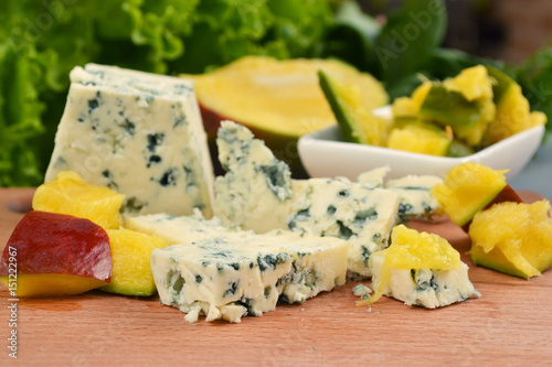 Blue cheese with pieces of frsh mango. The very soft and seductive Gorgonzola Dolce (sweet) style