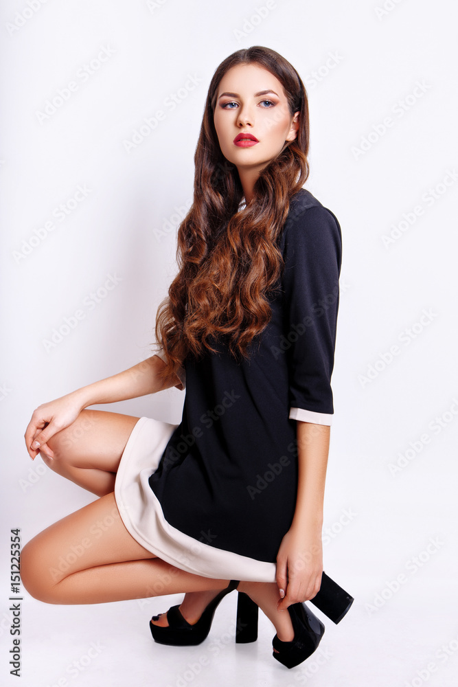 Studio photo of young woman on white background. Studio photo of young woman on white background.