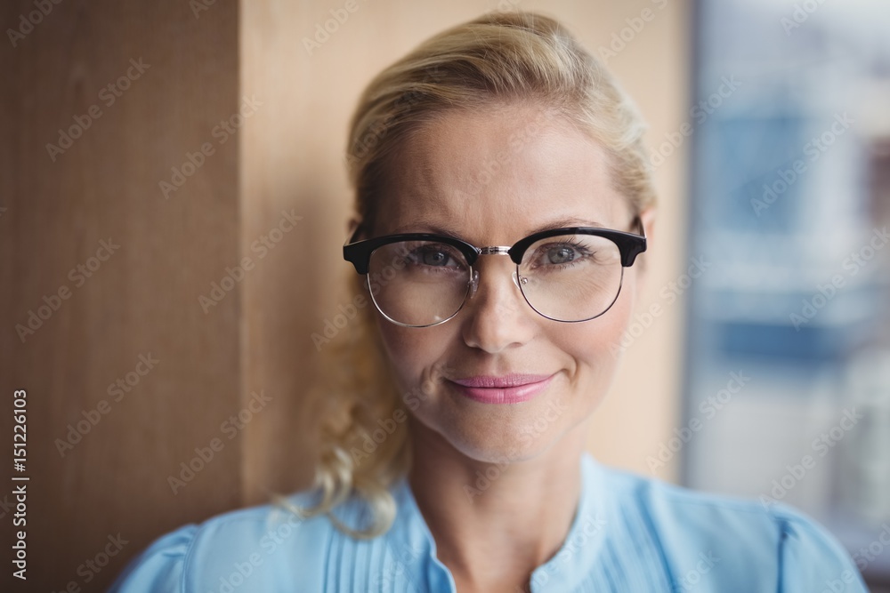 Portrait of smiling executive wearing spectacles