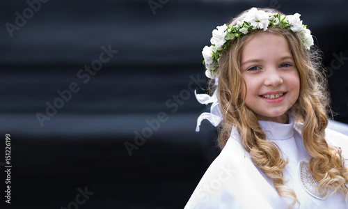 First Communion - smiling girl