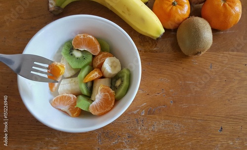 A bowl of chopped fruit