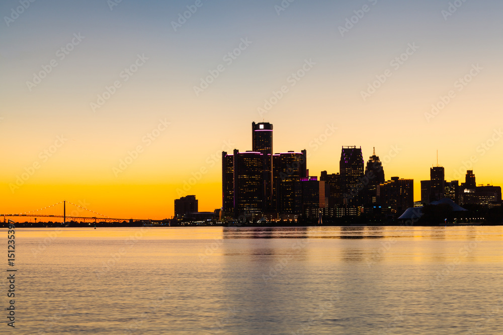 Sunset at Detroit River. General Motors Headquarters in Downtown Detroit, Michigan. Selective and soft focus.