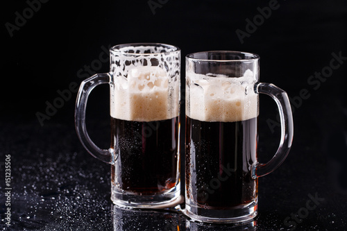 Beer on empty black table