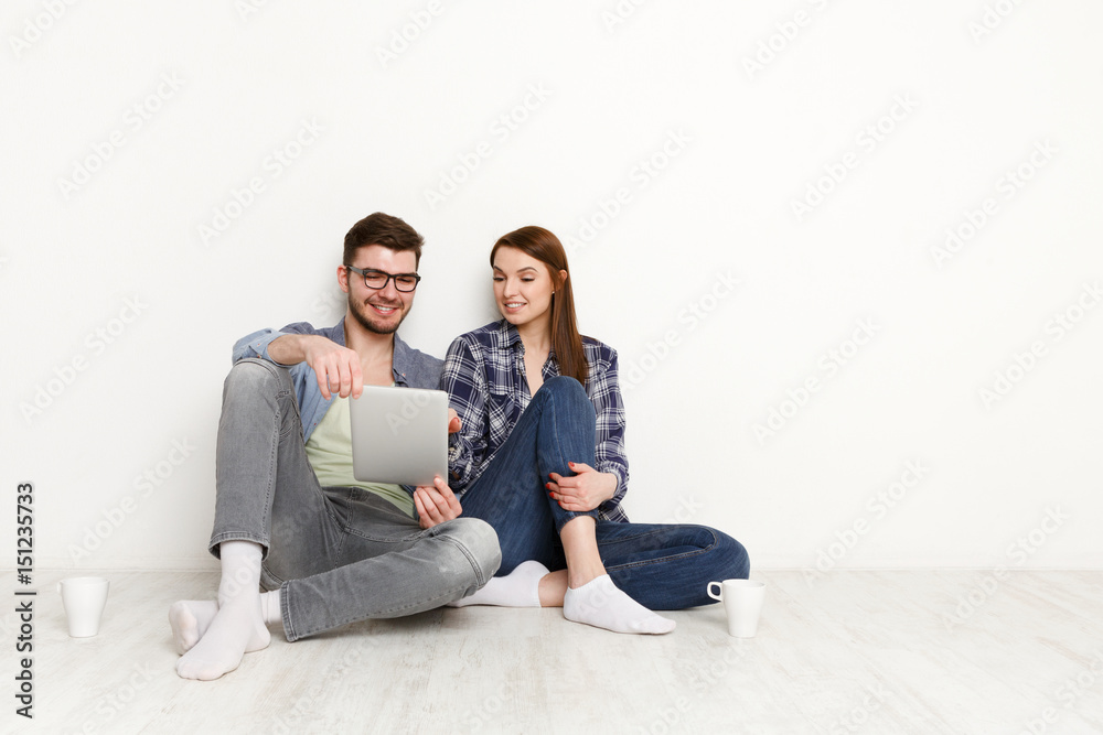 Couple ordering purchase with digital tablet Couple ordering purchase with digital tablet