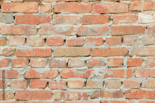 background texture of the old walls of bright red brick