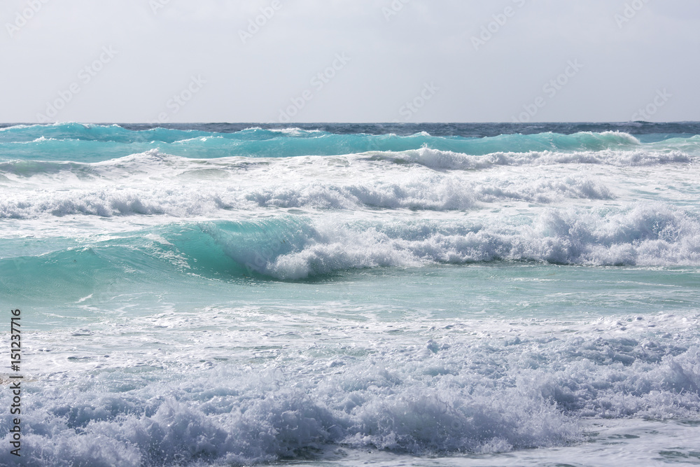 Surfer's paradise. Huge waves on the Caribbean sea shore. Dangerous tide.