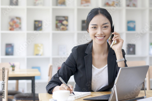 A business woman working on the laptop at the office