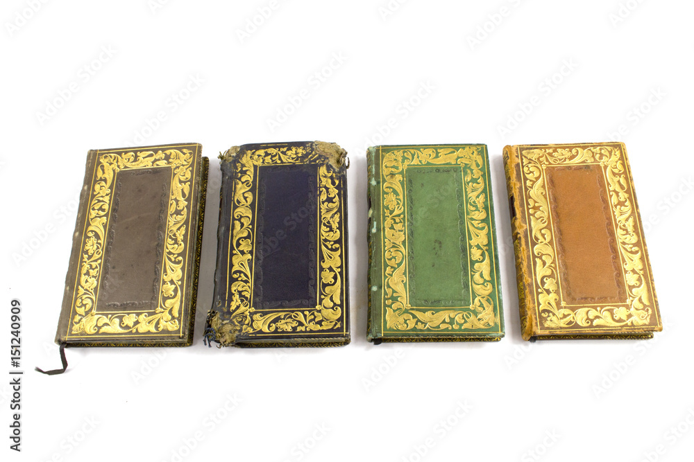 Miniature Antique Books on White Background Miniature Antique Books on White Background
