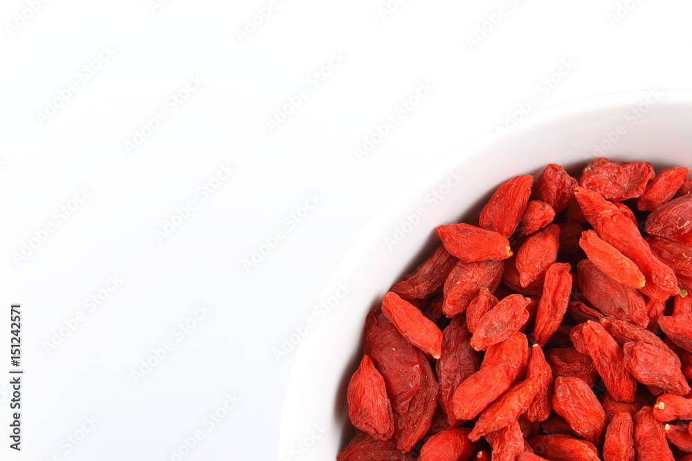 dried goji berries in a small white bowl dried goji berries in a small white bowl