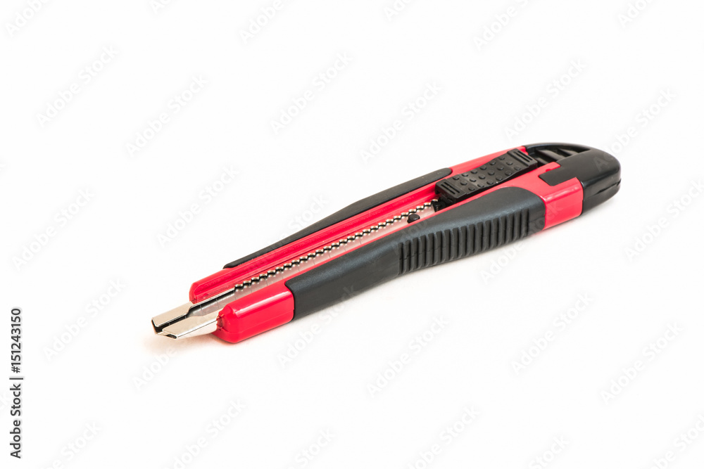Red and black knife cutter isolated on white
