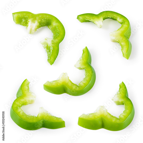 Pepper pieces. Slice of green paprika isolated. With clipping path. Collection.