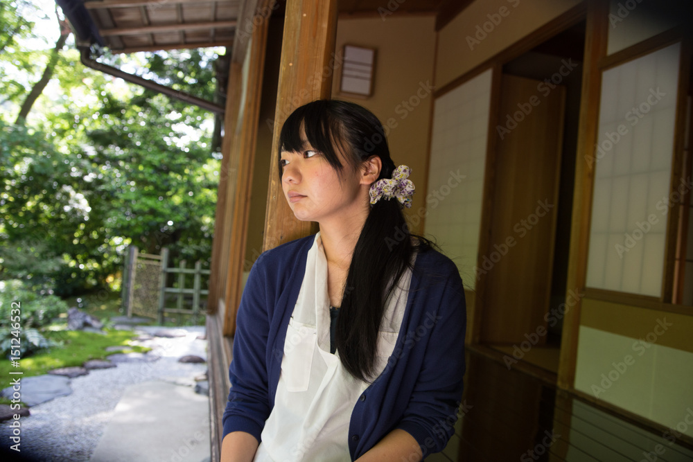 young asian woman in japanese veranda young asian woman in japanese veranda