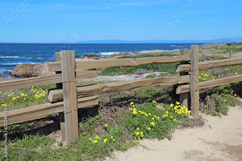 Split-rail fence at Asilomar State beach in Pacific Grove, California