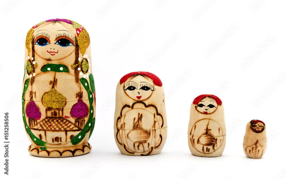 Matryoshka or Mamushka is a traditional Russian doll made of wood and  painted with colorful ornaments Photos | Adobe Stock