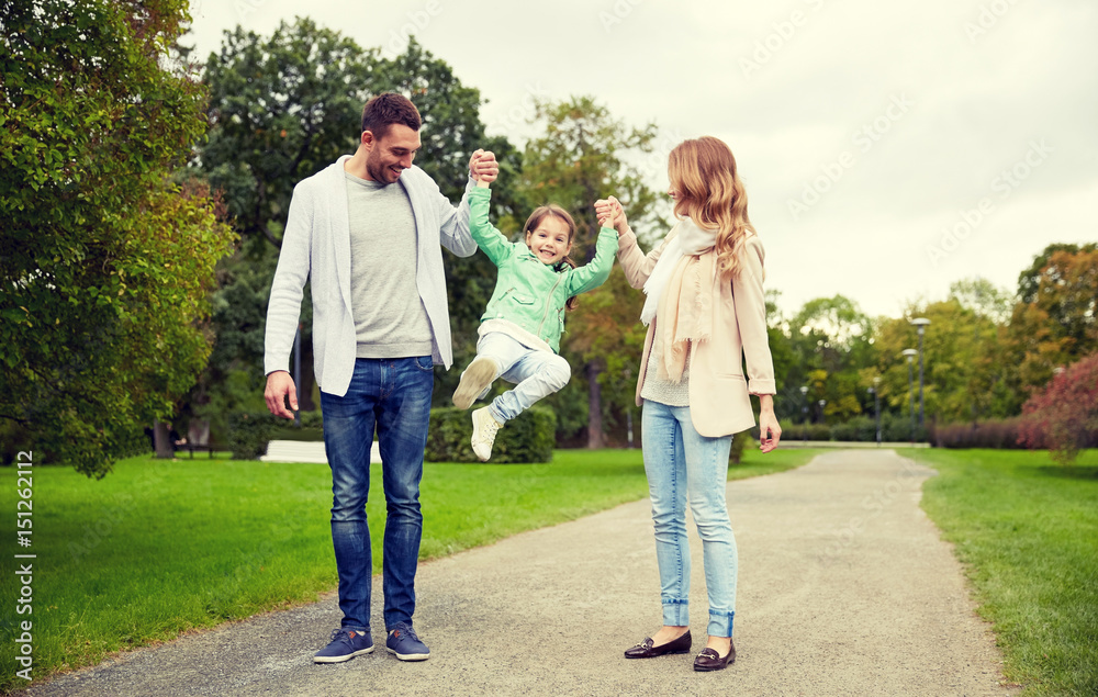 happy family walking in summer park and having fun happy family walking in summer park and having fun