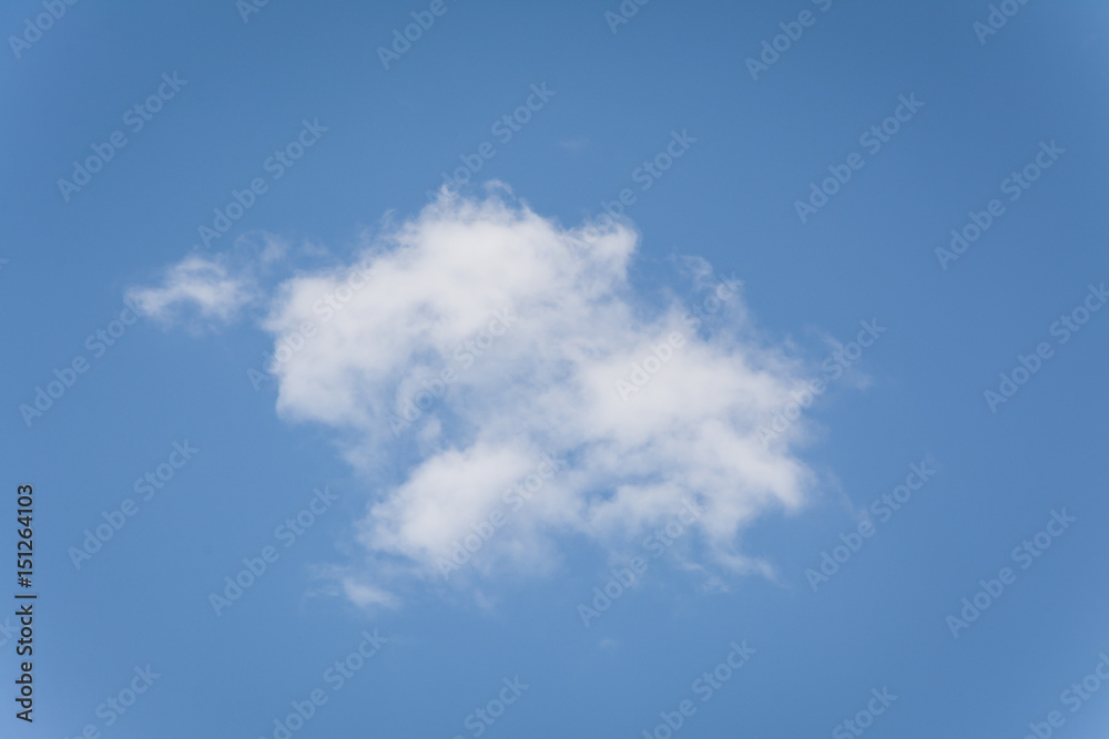  isolated cloud over blue sky.