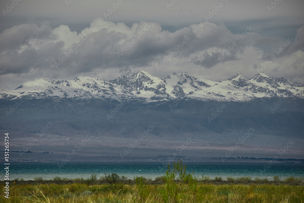 Mountain tops and Issykkul lake in Kyrgyzstan