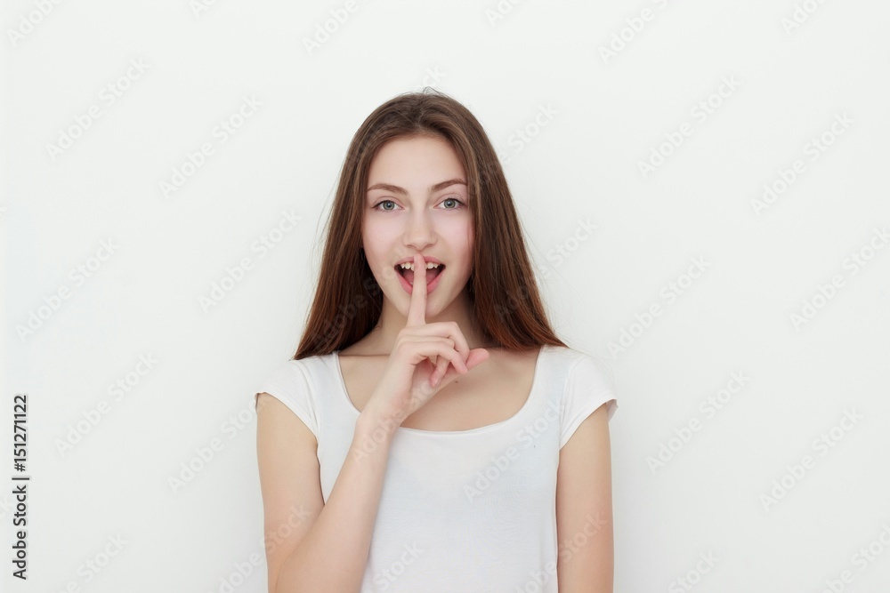 Cute young brunette asking to keep a secret Cute young brunette asking to keep a secret