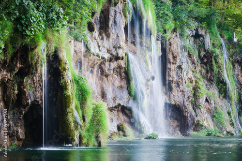 Beautiful summer forest waterfall