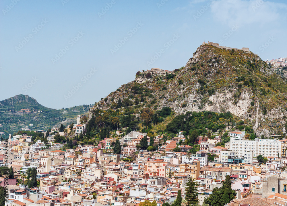 Fototapeta premium Cityscape of Taormina with Etna, Sicily, Italy