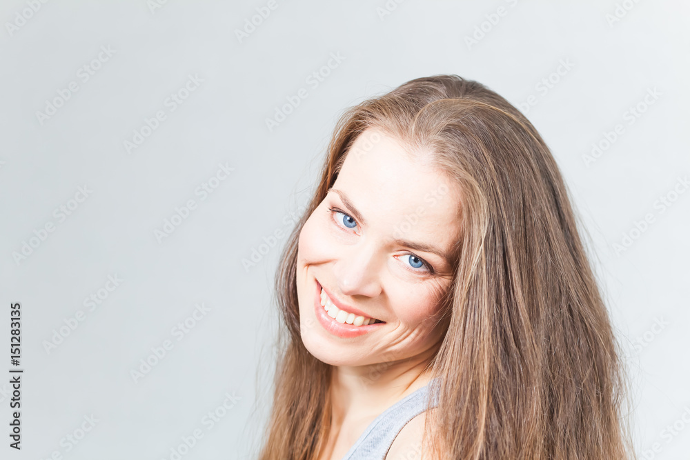 Beautiful girl with long hair smiles Beautiful girl with long hair smiles