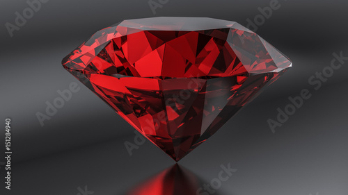 Ruby diamond on the dark background.