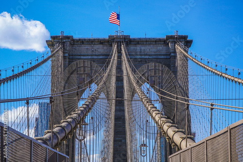 One of the main attractions in New York - famous Brooklyn Bridge- MANHATTAN / NEW YORK - APRIL 1, 2017
