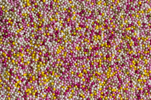 Colorful sugar balls in the form of a background