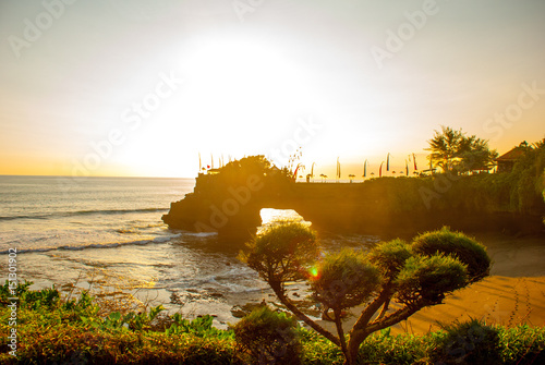 Tanah Lot water temple in Bali. Indonesia nature landscape. Sunset photo