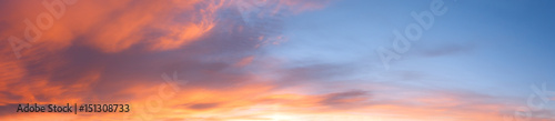 Sunrise sky panorama with clouds