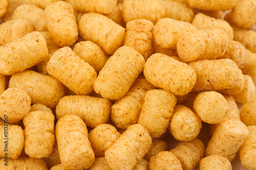 top view of corn puff snacks pile texture