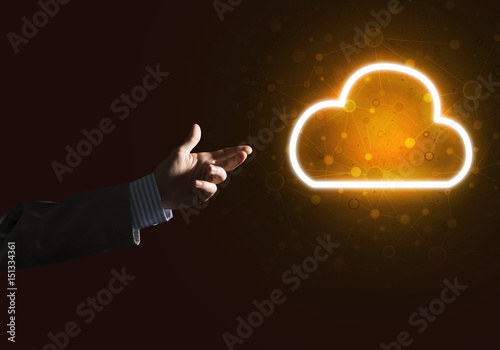 Digital cloud icon as symbol of wireless connection on dark background