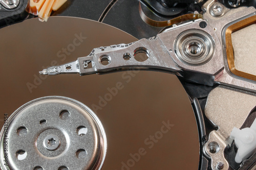 information storage device, magnetic head of hard disk closeup