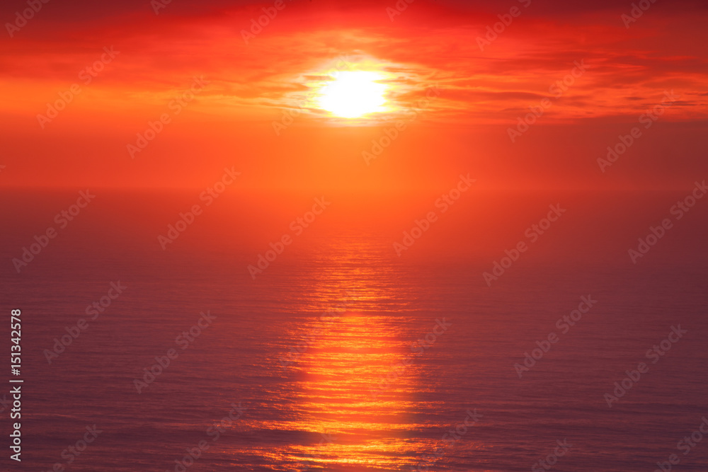 Orange Sunset with sea reflection