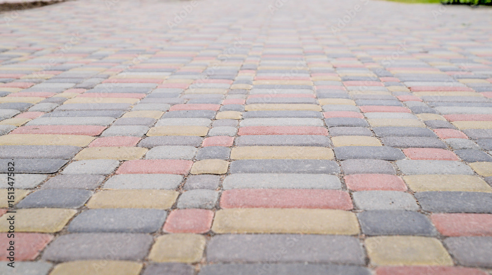 Fototapeta premium Background, texture of urban multicolored pavers on the whole frame. Horizontal frame