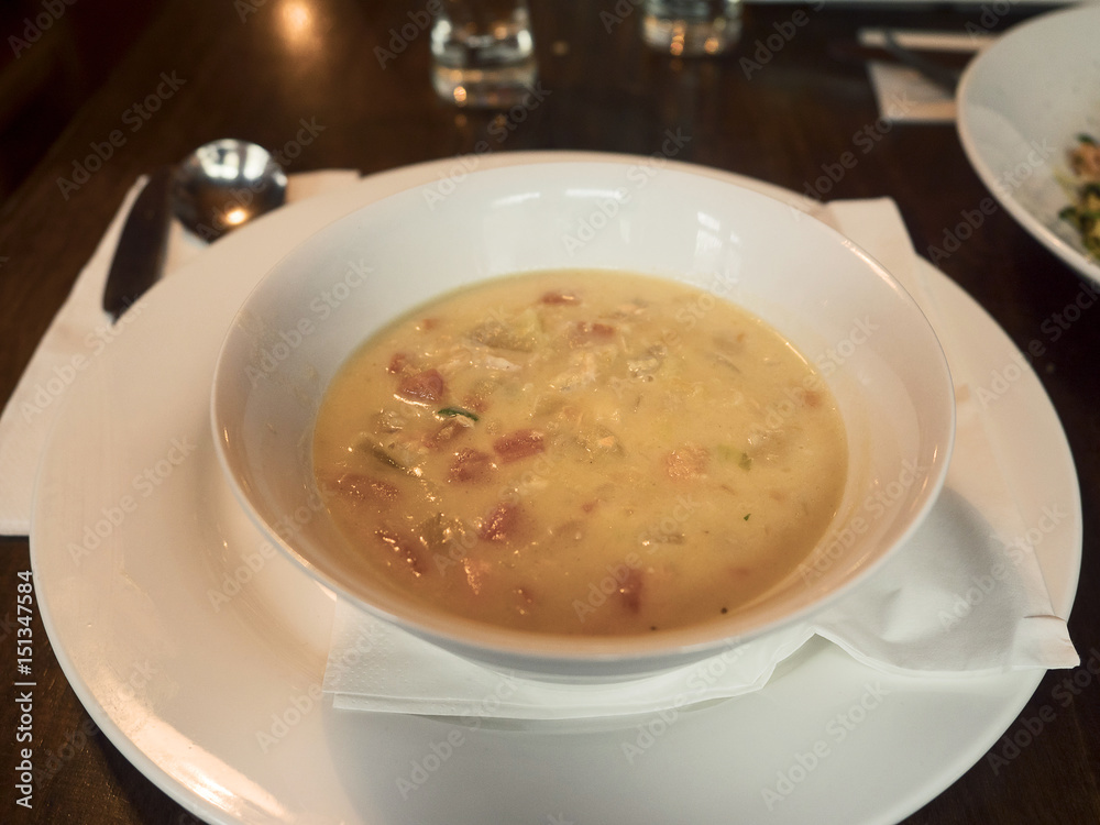 Fish creamy chowder in a plate served in a pub,. Fish creamy chowder in a plate served in a pub,.