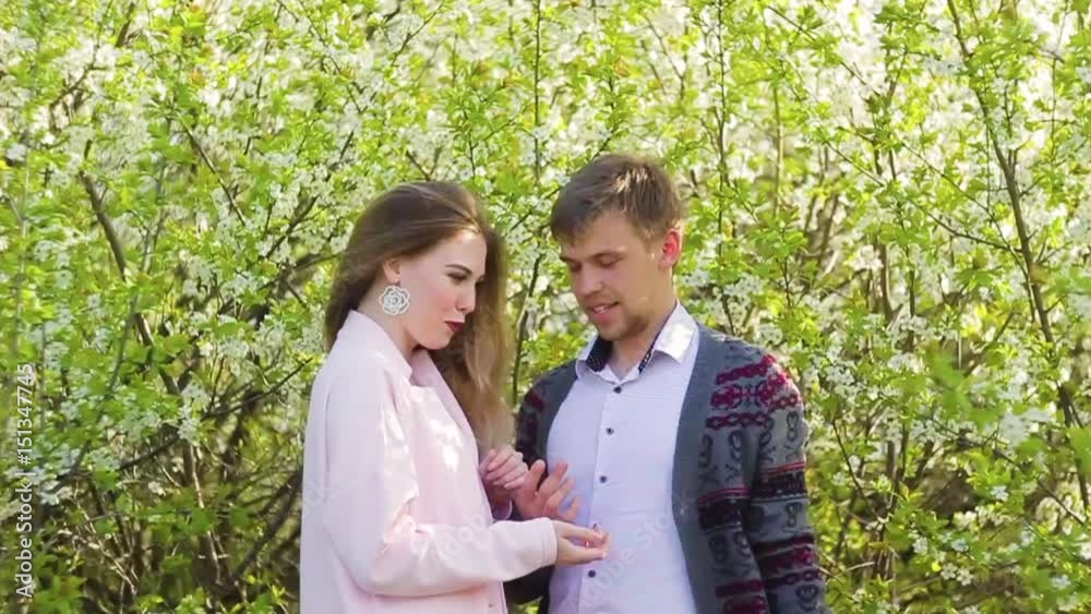 Romantic happy loving couple on nature in spring Romantic happy loving couple on nature in spring