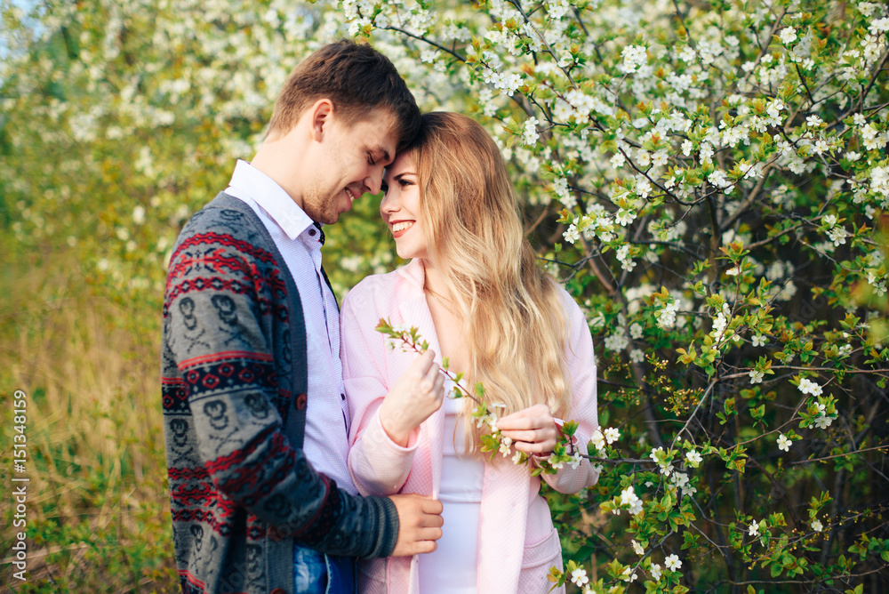 Romantic happy loving couple on nature in spring Romantic happy loving couple on nature in spring