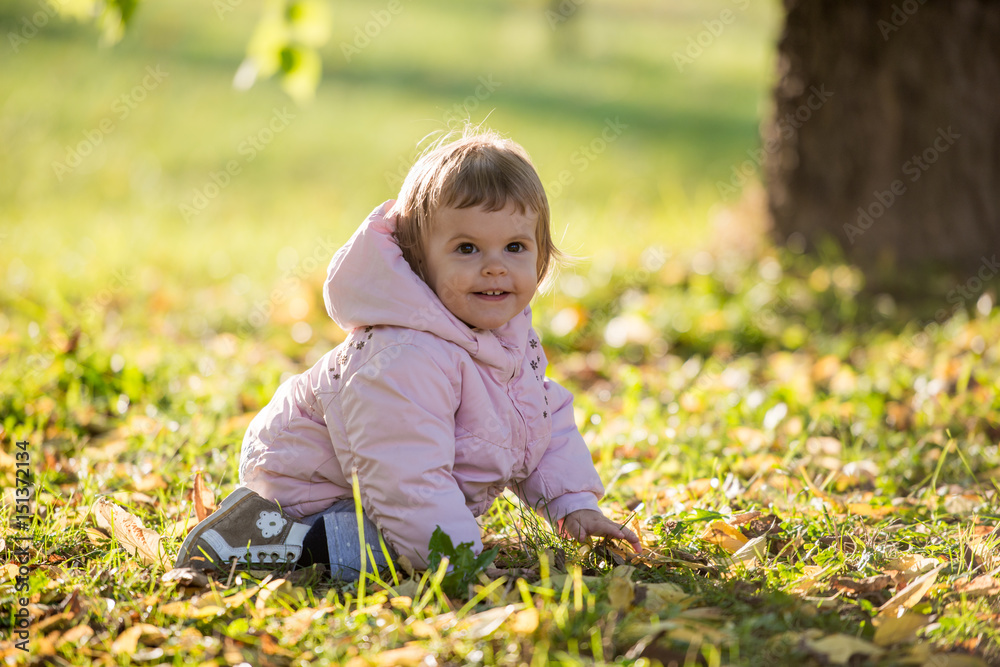 Portrait of cute young girl enjoying spending time in park Portrait of cute young girl enjoying spending time in park