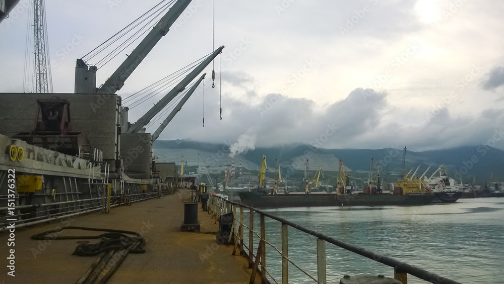 The type of port cranes in the background of the landscape of th