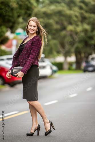 outdoor portrait of young gorgeous lady, woman in city, urban casual lifestyle shot