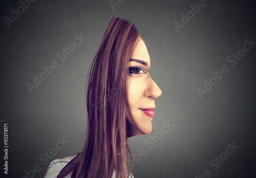 surrealistic portrait front with cut out profile of a woman