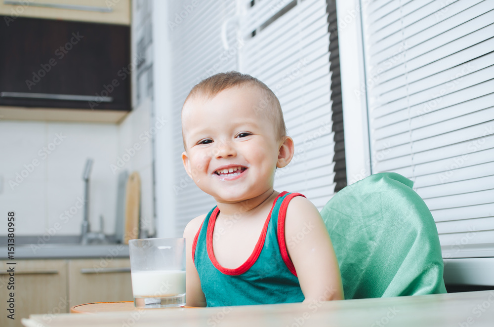 Beautiful little boy drinking milk Beautiful little boy drinking milk