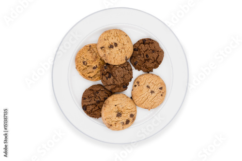 Chocolate chip cookies on plate on white background.