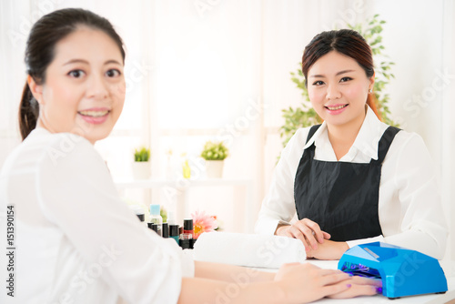 woman doing manicure and her manicurist © PR Image Factory