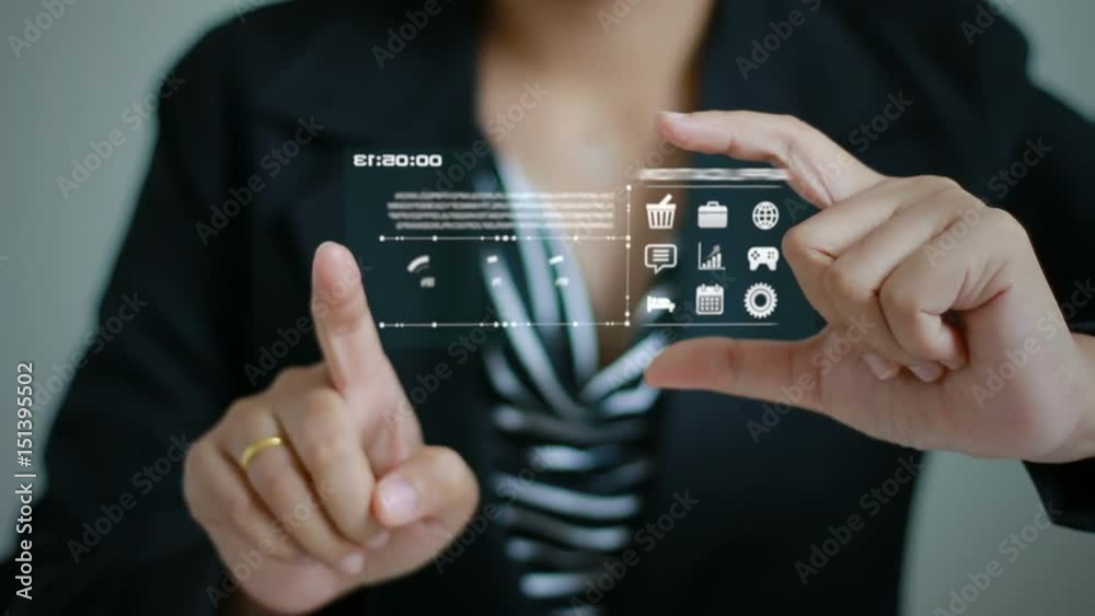 Hands of business woman using screen hologram technology and user interface for business analytict concept for smart device and futuristic