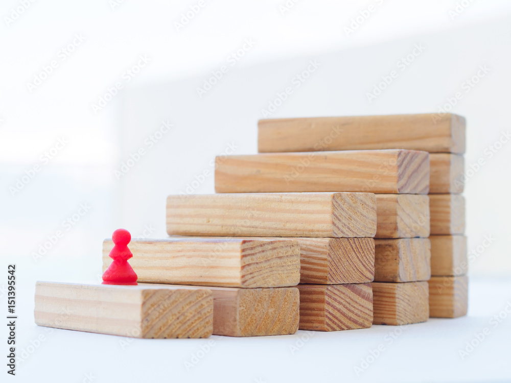 Concept of building success foundation. wooden blocks in the shape of a staircase
