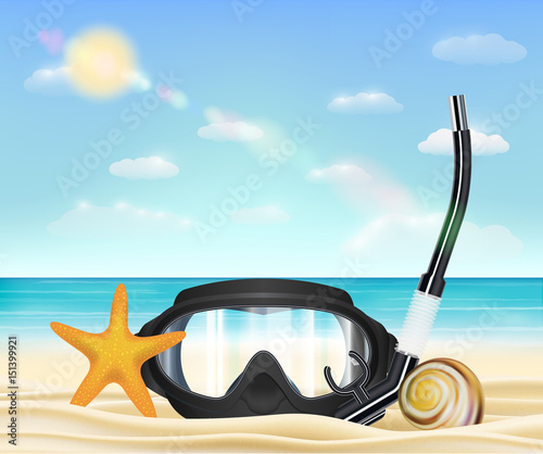 Scuba diving  mask on a sea sand beach