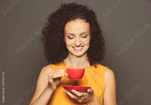 Young attractive woman hold...