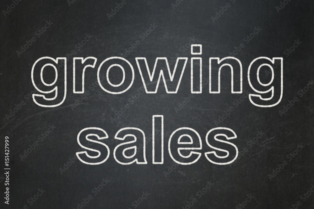 Finance concept: Growing Sales on chalkboard background Finance concept: Growing Sales on chalkboard background